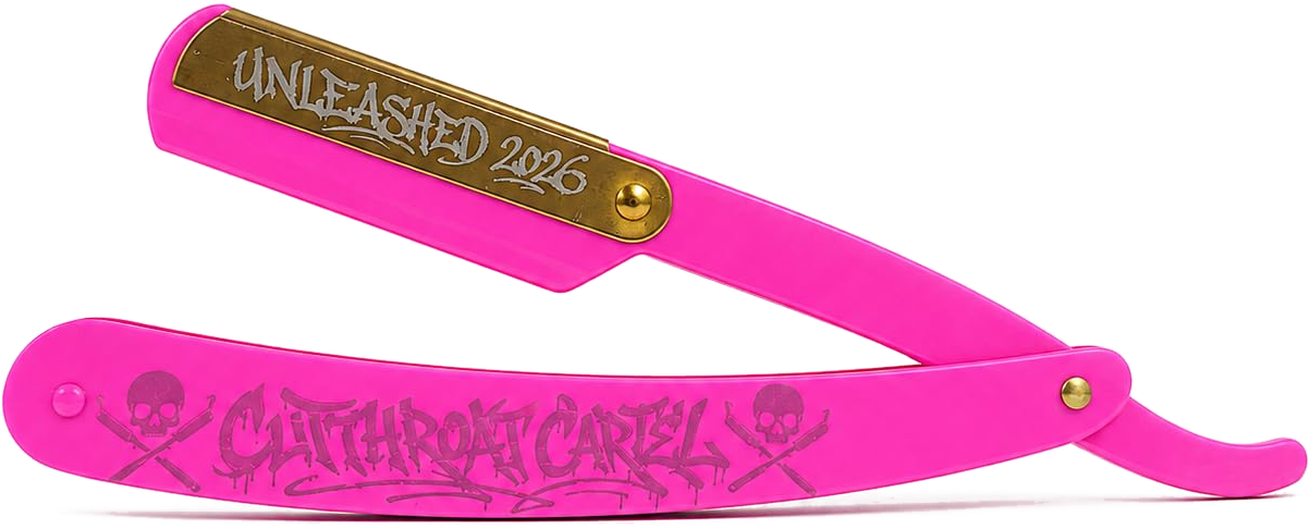 The Cutthroat Cartel folding barber's razor open, with a hot-pink handle, brass-finished blade plate engraved Unleashed 2026, and Cutthroat Cartel lettering along the handle.